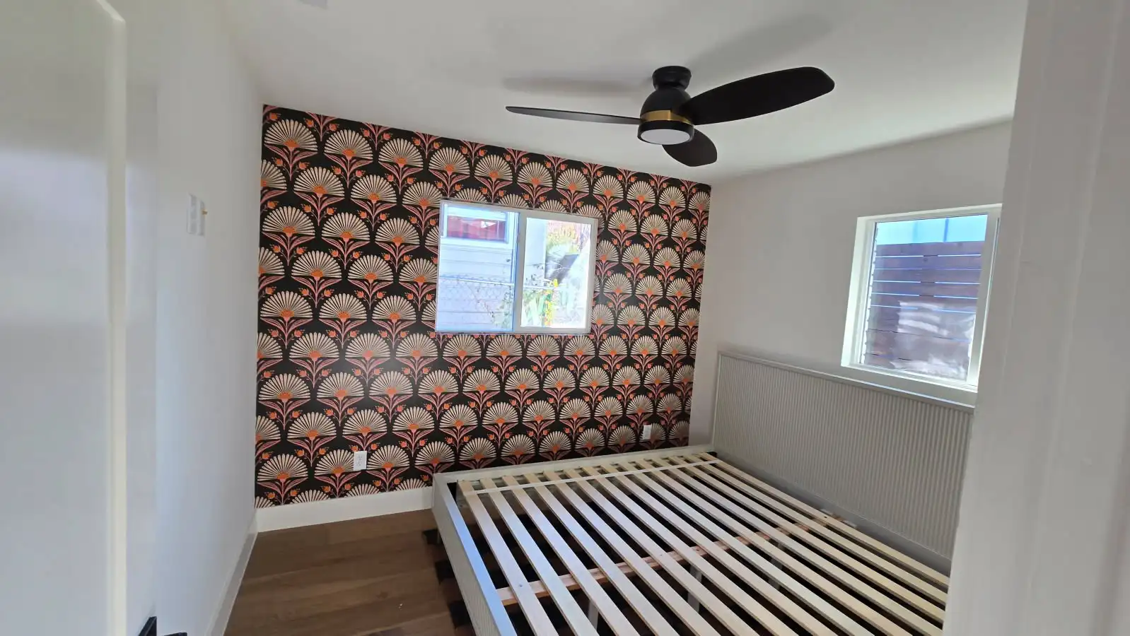 Art Deco fan pattern on a bedroom feature wall